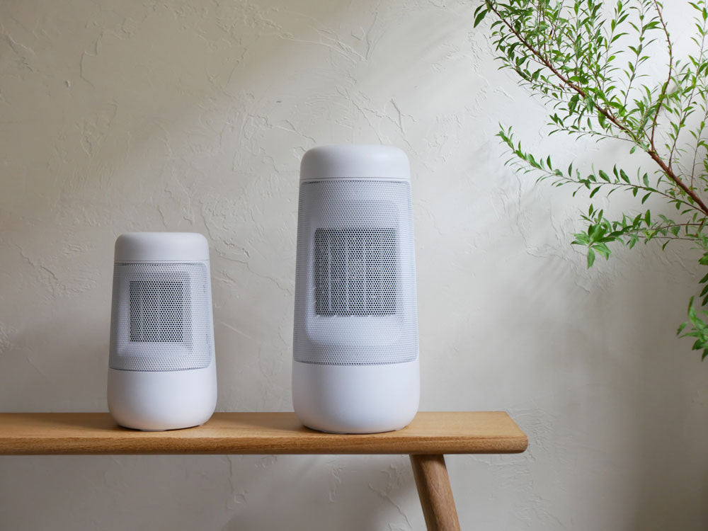 スリーアップのハンドル付き首振りセラミックファンヒーターSモデルのデザインとプラスチック製ボディの正面ビュー