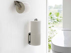 タワーウォールトイレットペーパーホルダー。スチール製で二つのトイレットペーパーを収納できる円筒形デザイン。